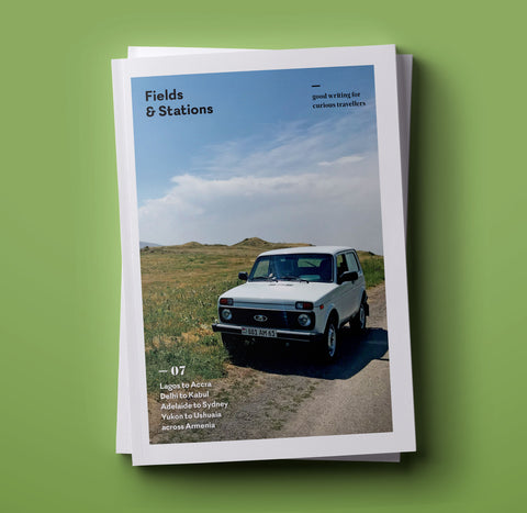 Fields & Stations issue 7 cover, of a car stopped on the side of the road in the Armenian countryside.